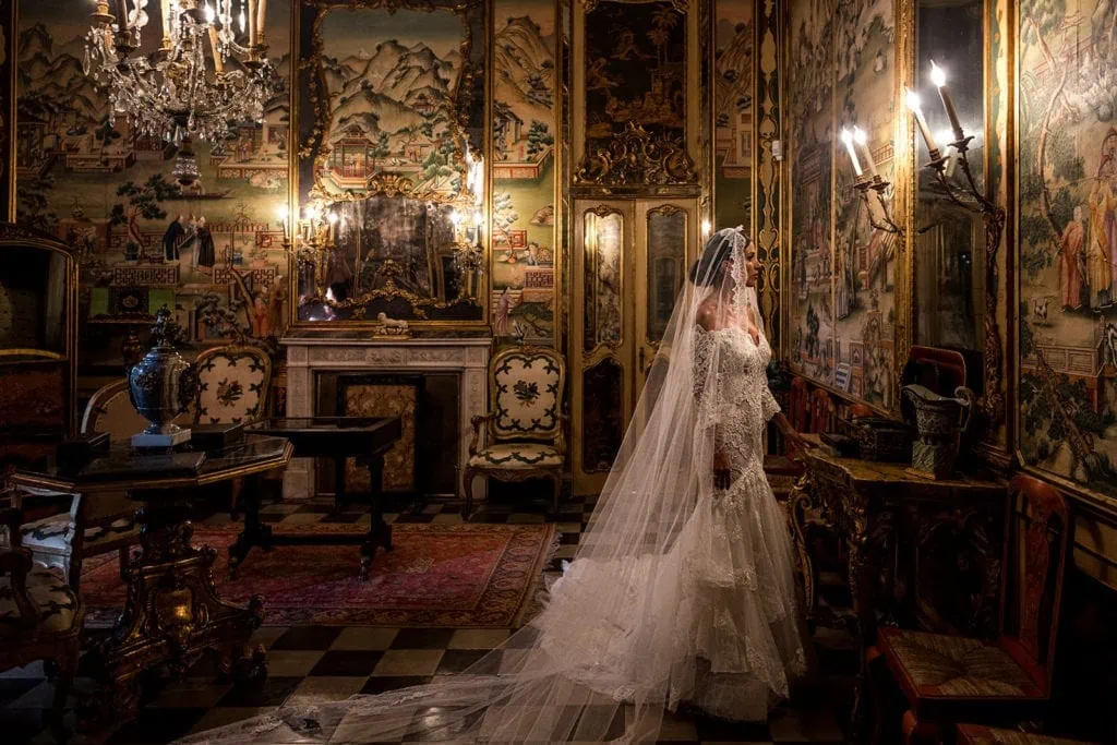 Bride stands for bridal portrait at Villa D'Orri, Sardinia wedding
