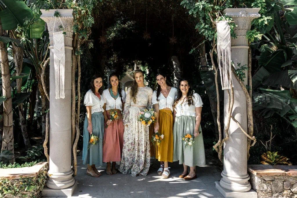 Bridesmaids stand with bride at Casa Hyder wedding in San Miguel de Allende