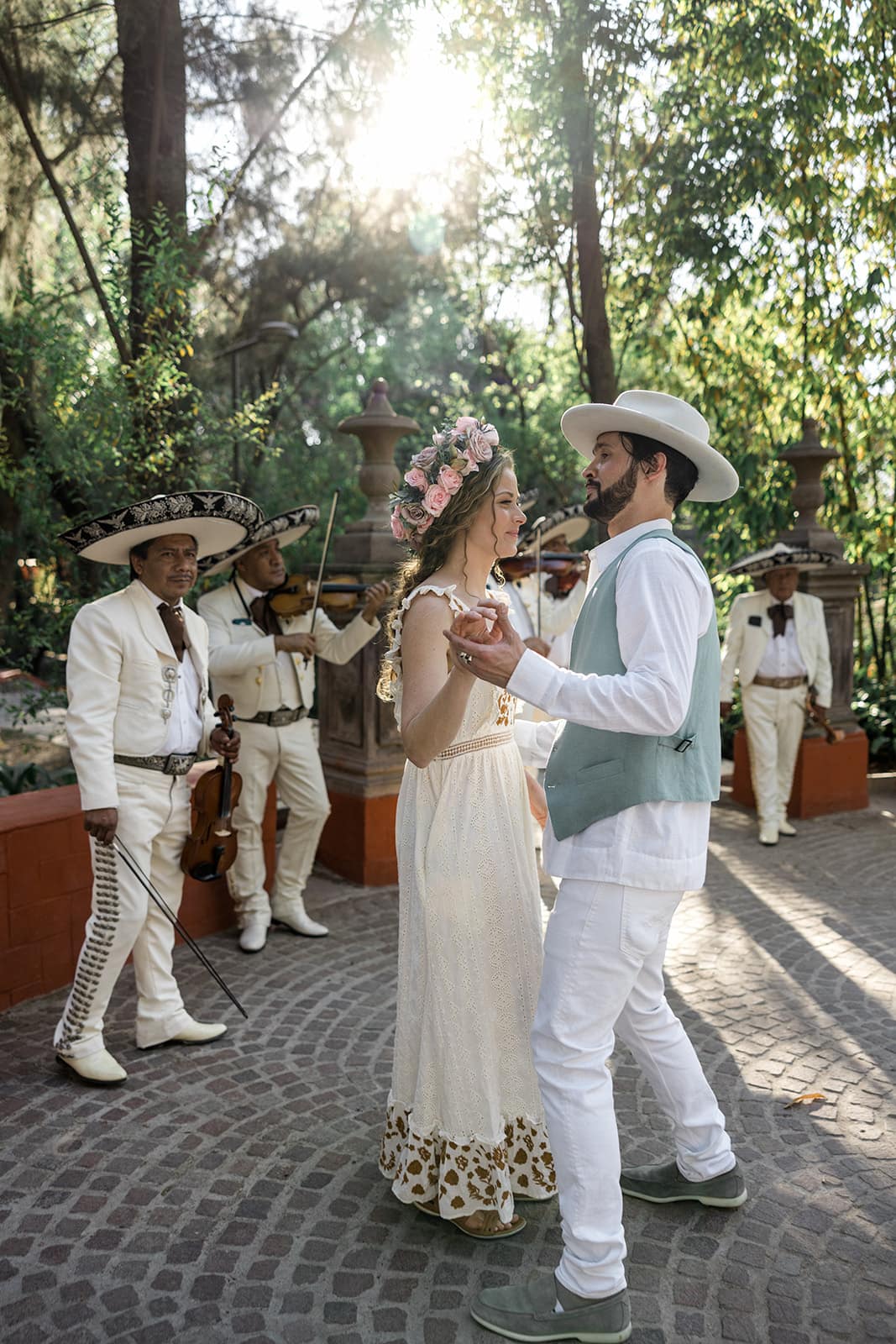 Bride and groom dance during wedding parade in San Miguel de Allende