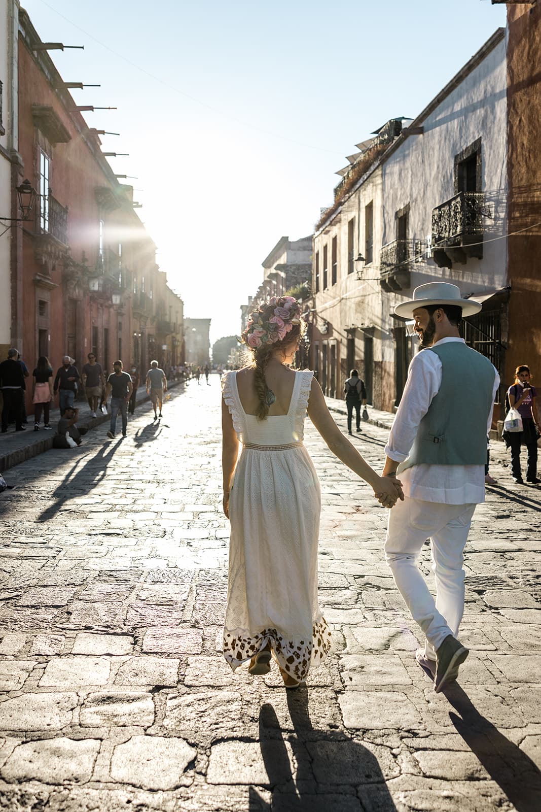 Bride and groom walk streets of San Miguel de Allende Mexico
