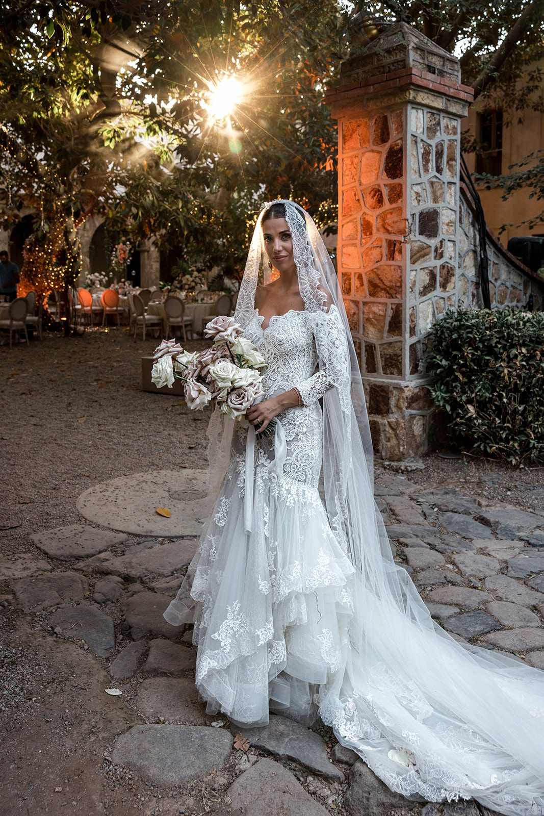 Bride wears classic bridal gown for wedding ceremony at Villa D'Orri
