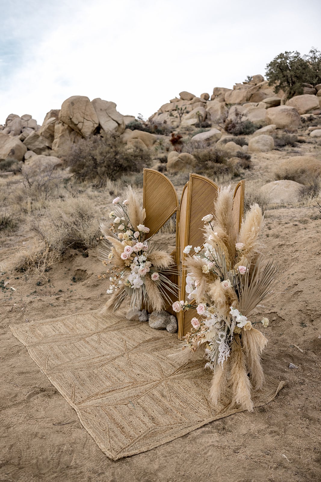 Pampas grass and jute rug for elopement ceremony decor in Joshua Tree