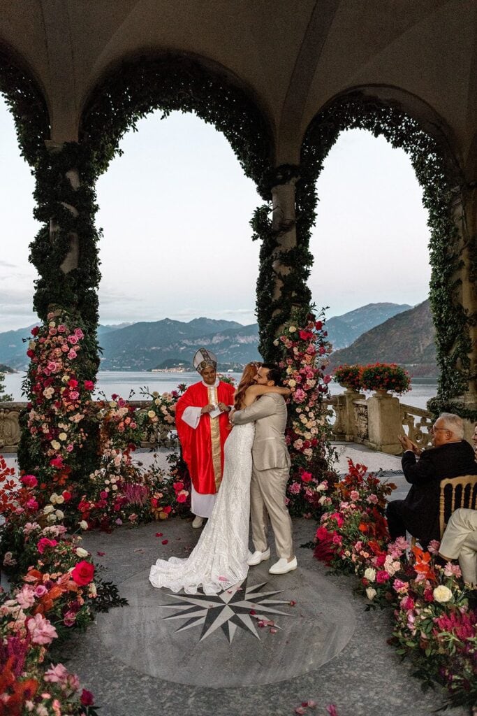 Bride and groom embrace after wedding ceremony at Villa del Balbianello