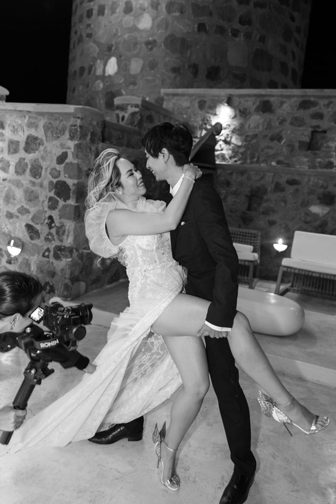 Bride and groom dancing at Cavo Ventus in Santorini