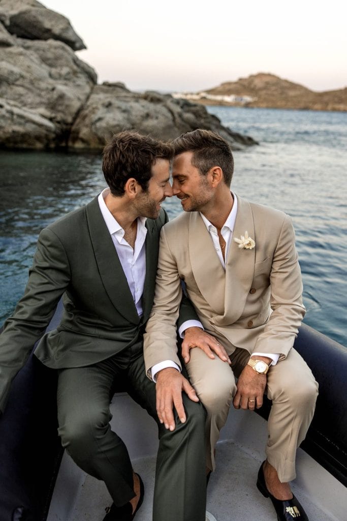 Grooms portraits on Riva boat in Greece