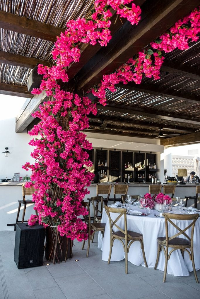 Mykonos restaurant with pink flowers
