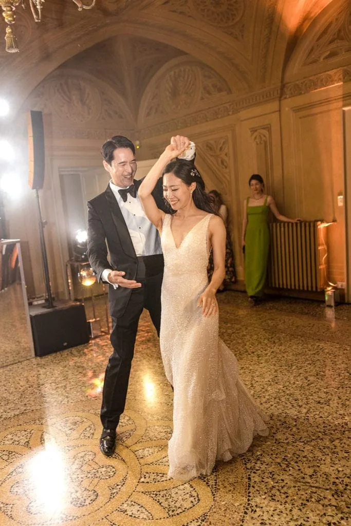Bride and groom dancing together in Villa Gastel