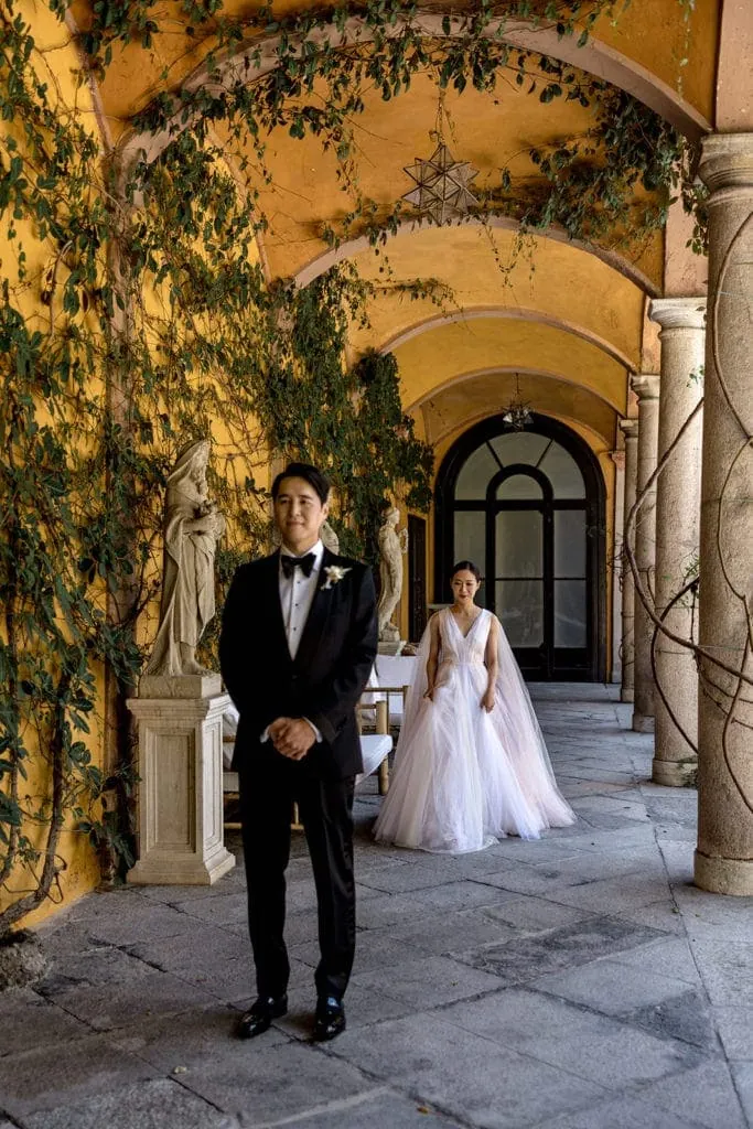 Bride walks to her groom for a first look at Villa Gastel wedding venue