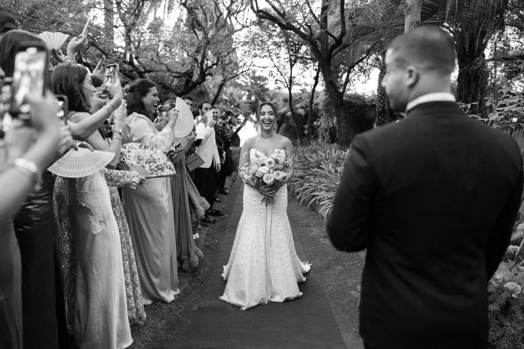 Bride walks to groom during wedding ceremony
