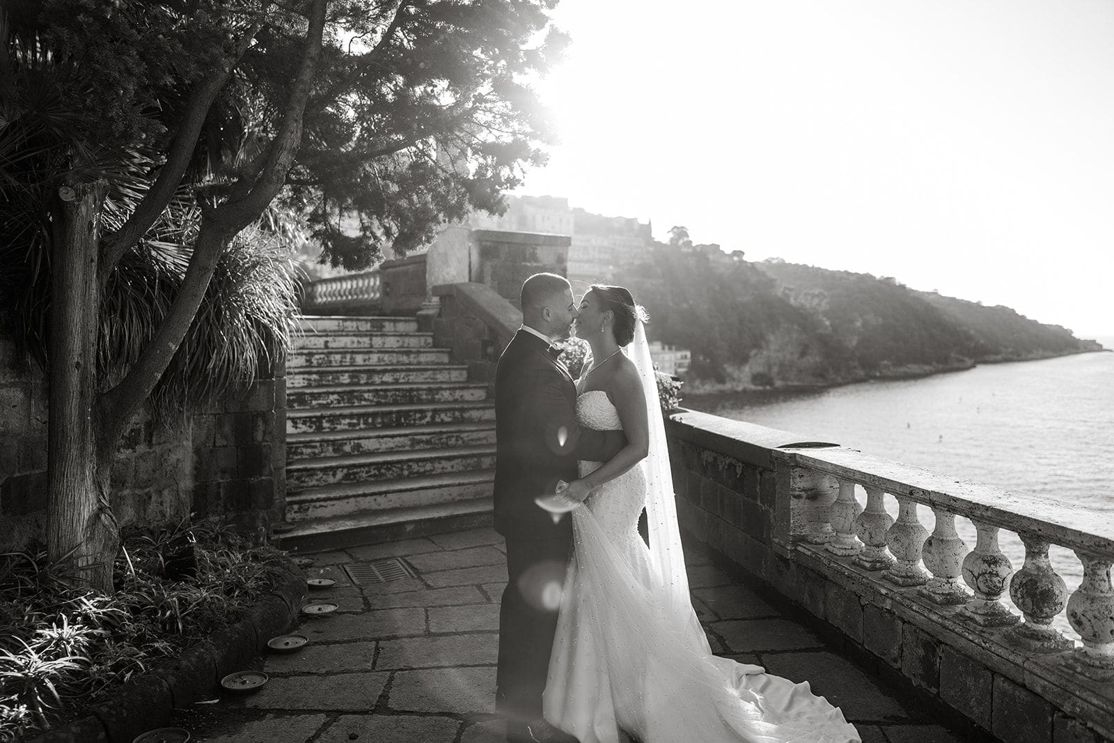 Black and white portrait of bride and groom during first look at Villa Astor