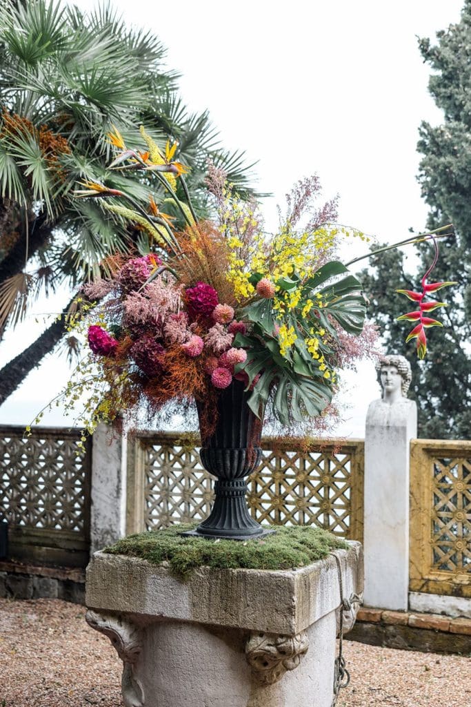Floral arrangement outdoors at Villa Astor wedding venue