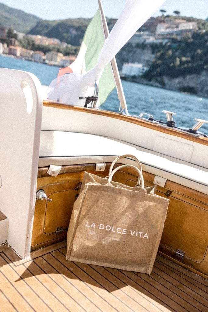 La Dolce Vita bag on boat in Amalfi Coast Italy
