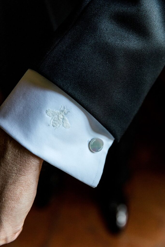 Groom embroidered shirt cuff detail