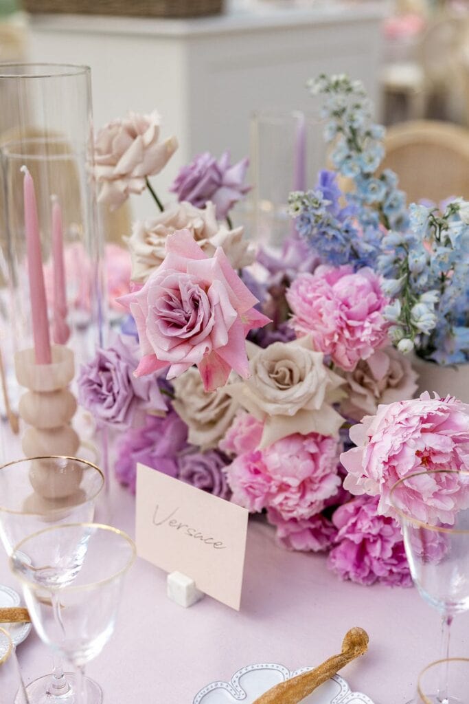 Pink and purple flower arrangement at Tuscany wedding