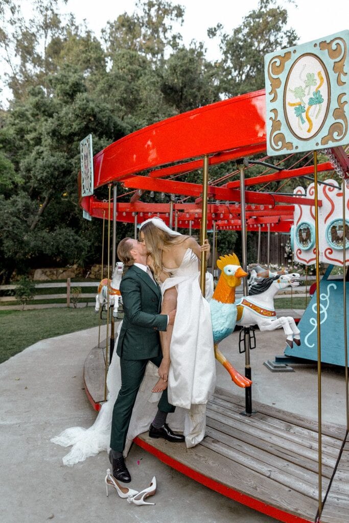 Bride and groom on merry-go-round