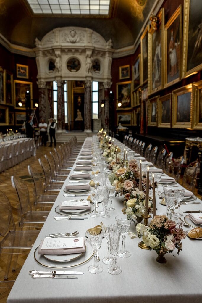 Wedding reception banquet tables inside French chateau museum