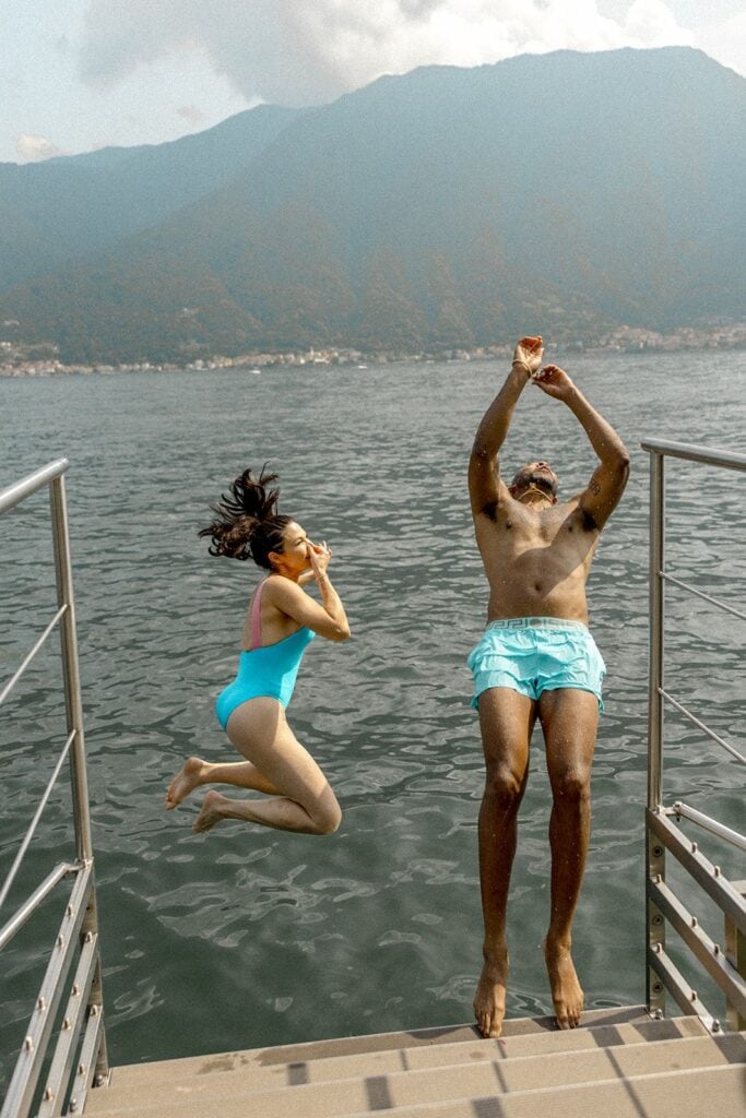 Bride and groom jump into Lake Como
