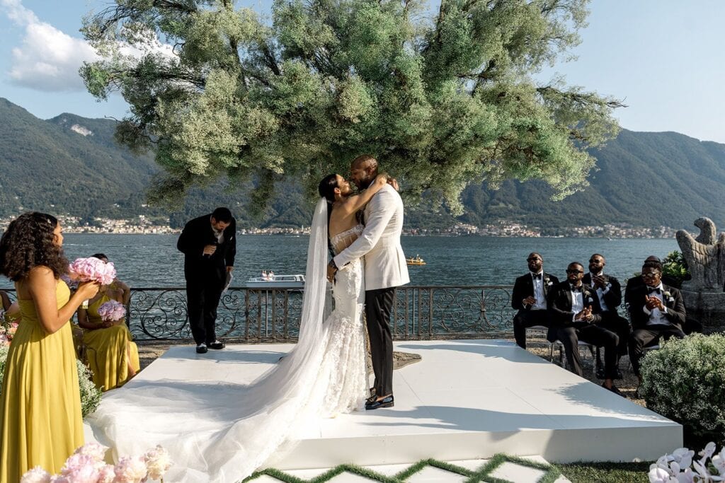 Bride and groom kiss wedding ceremony Lake Como