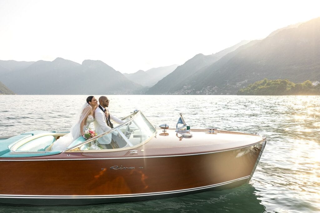 Couple's just married portrait on Lake Como Riva boat