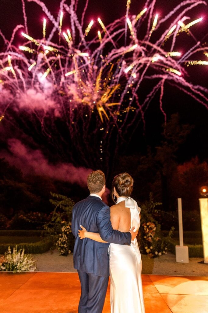 Bride and groom wedding reception fireworks show