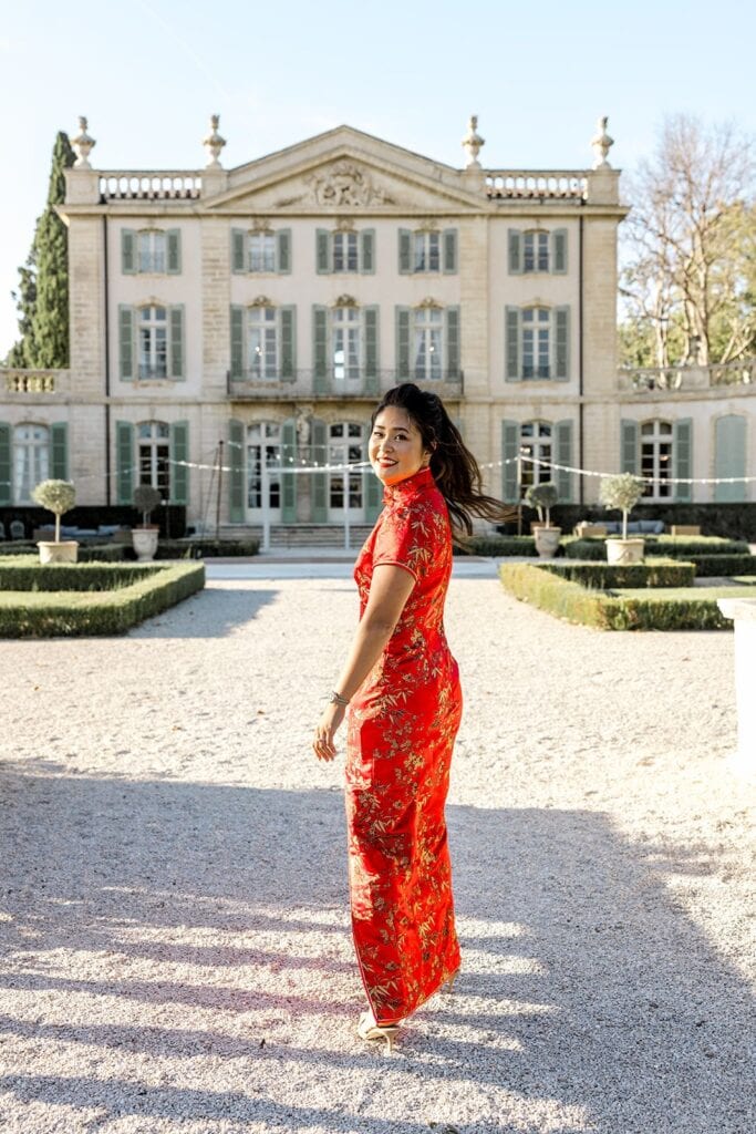 Bride in red qipao at Chateau Tourreau, a south of France destination wedding venue