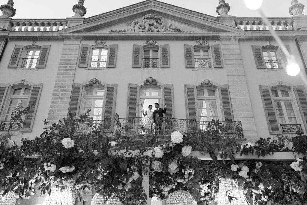 Black and white bride and groom Chateau Tourreau balcony portrait