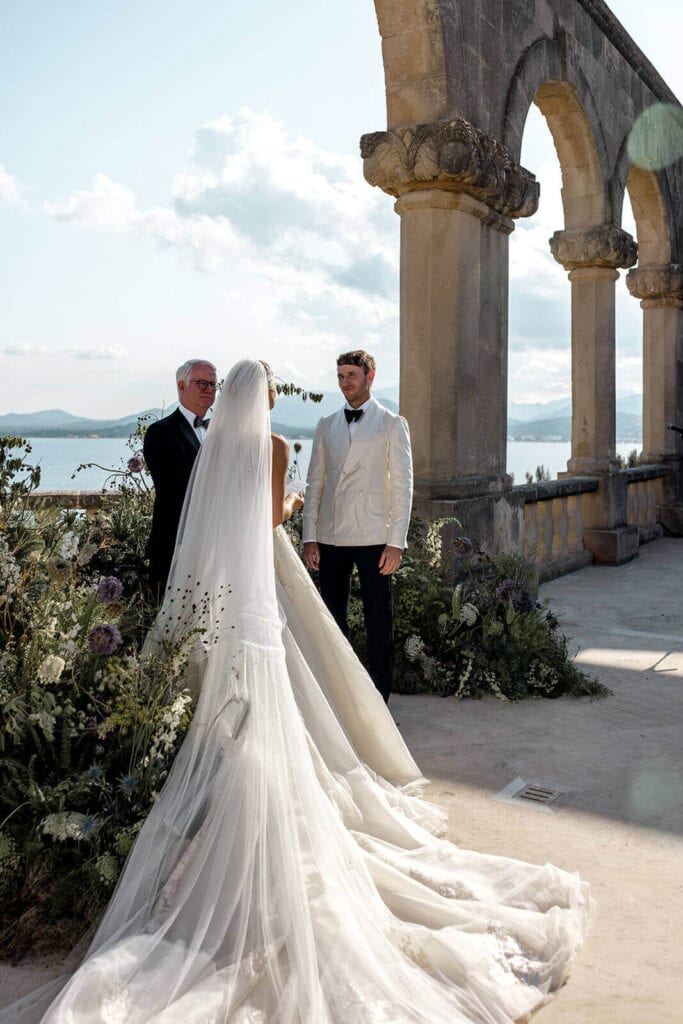 Caroline and Ryan's wedding ceremony at La Fortaleza in Mallorca, photographed by Lilly Red