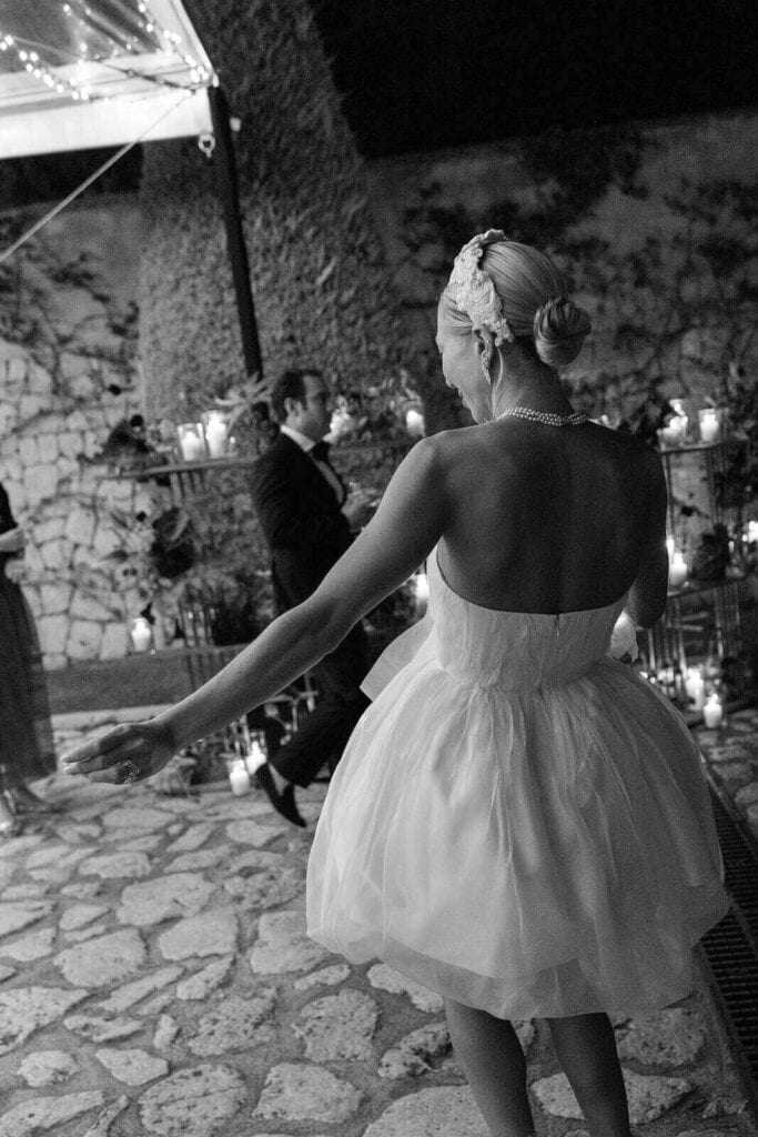 Bride dancing at Mallorcan wedding, photographed by Lilly Red