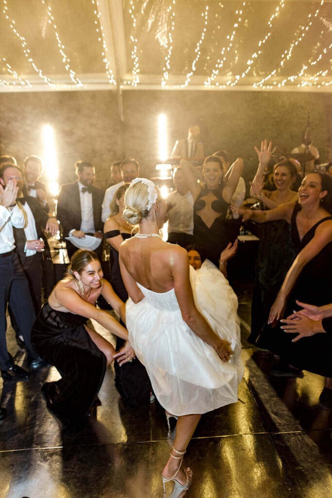 Bride on the dancefloor, photographed by Lilly Red