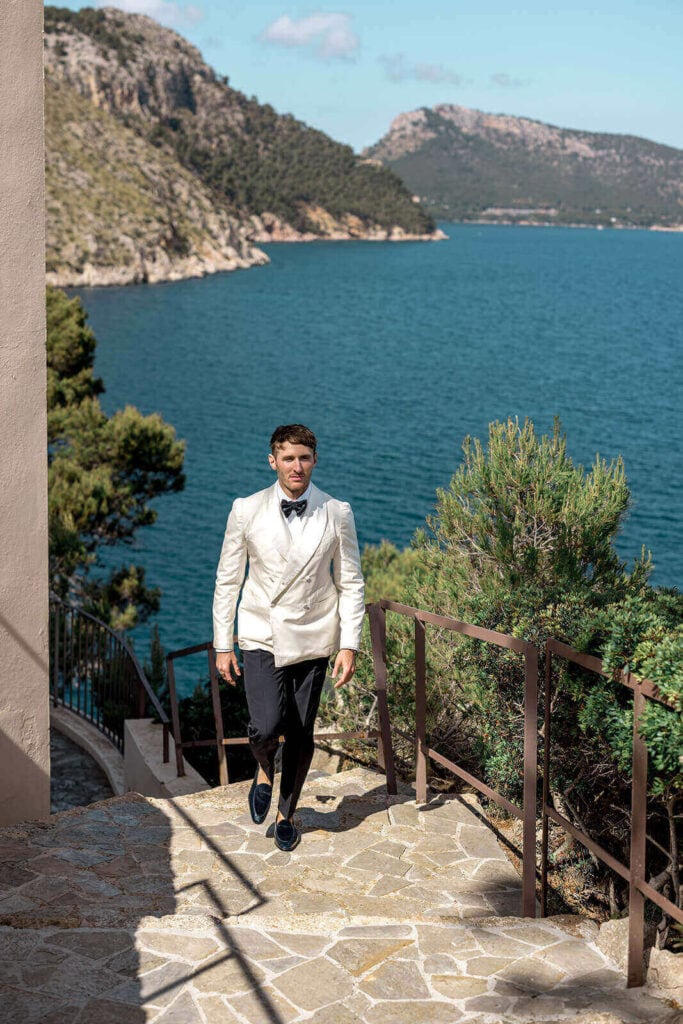 Groom wearing custom Hadleigh's suit on Mallorcan wedding day, photographed by Lilly Red